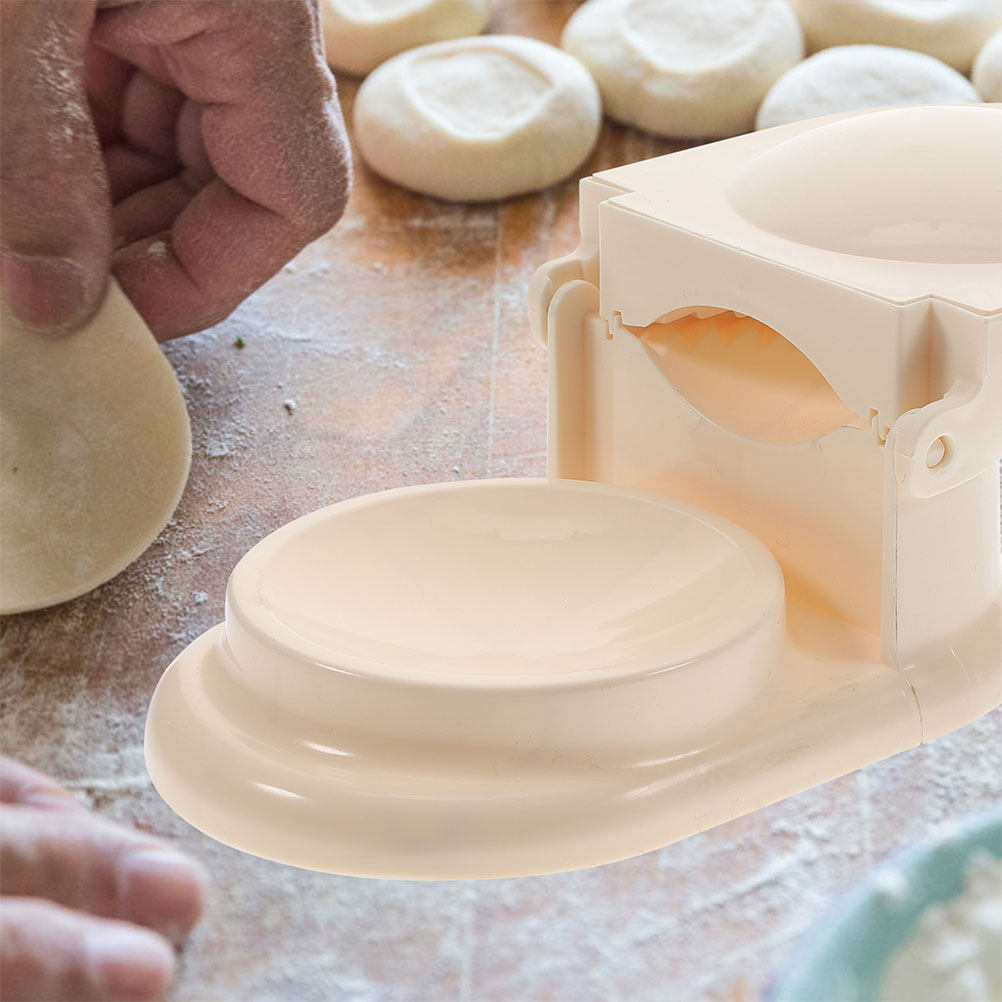 قطعتان من أداة ضغط عجينة الزلا - مراجعة Kitchen Gadgets Dumpling Maker وسعره